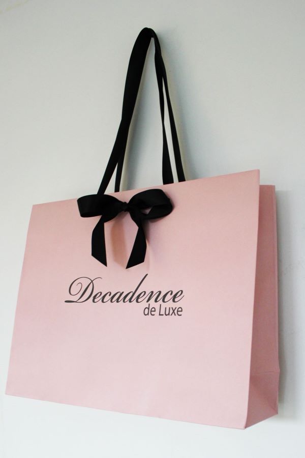 Túi đựng quần áo màu hồng ngà